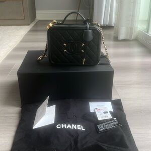 Chanel black filigree handbag